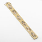 Złota bransoletka z geometrycznym wzorem, wykonana w technologii plecionej, próba 0,585, XX wiek.