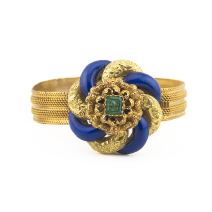 Złota bransoletka z XIX wieku, zdobiona niebieską emalią kobaltową i centralnym szmaragdem.